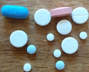 Photo of various pills including antiretrovirals