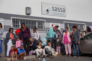 Photo of people waiting for social grants