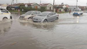 Photo of cars in flooded road