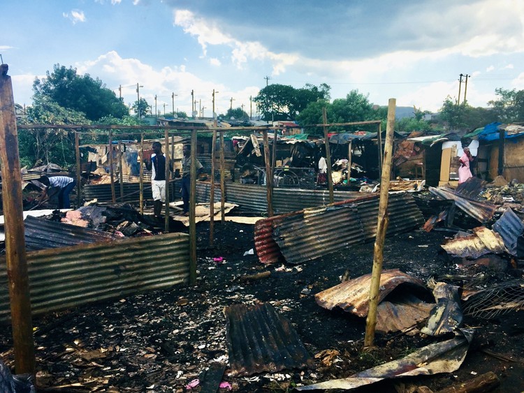 Photo of burnt shacks