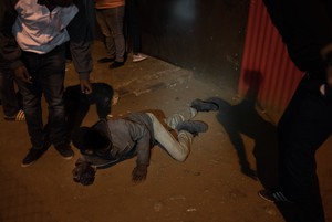 Photo of man being beaten