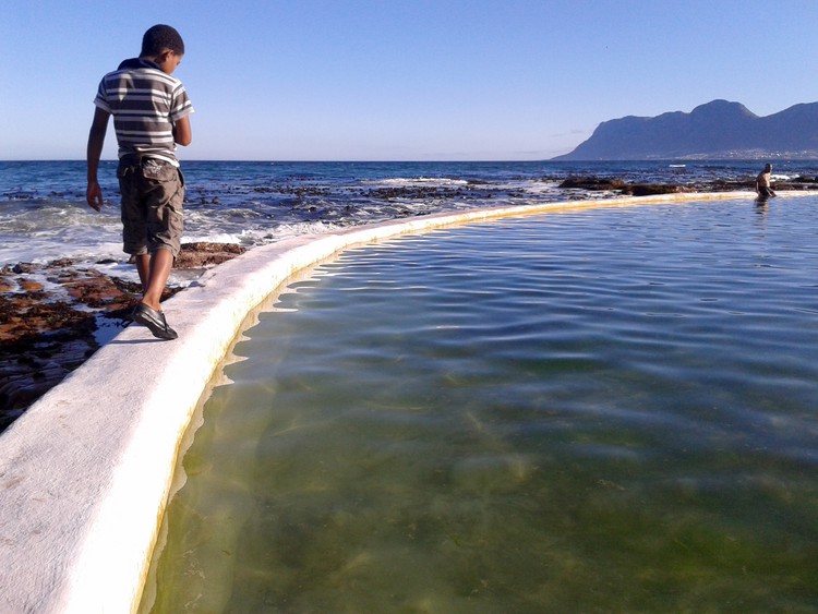 Photo of boy and tidal pool