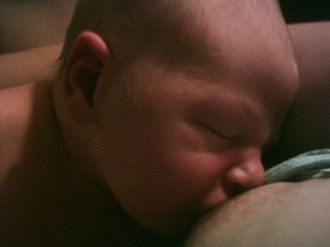 Photo of child breastfeeding
