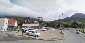 Photo of Hout Bay police station with mountain in background