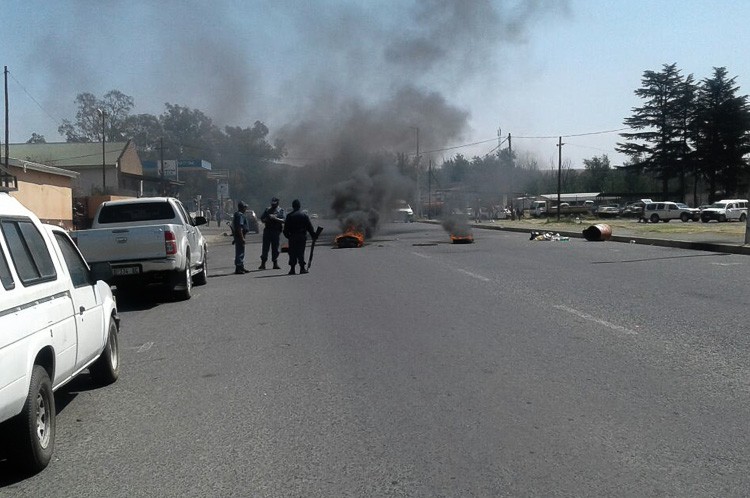 Photo of burning tyres in road