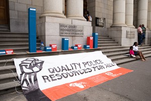 Photo of banner in front of the Cape High Court