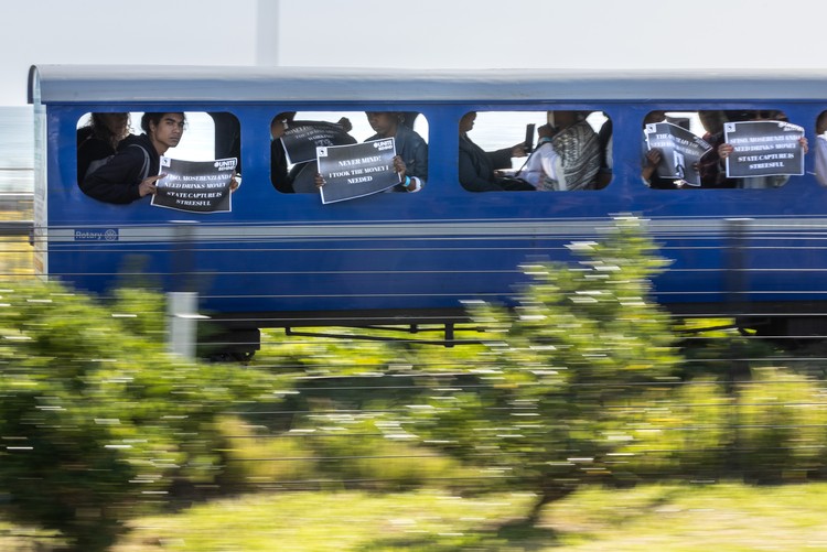 Activists protest at Mini Blue Train to highlight PRASA’s failures. - Ashraf Hendricks