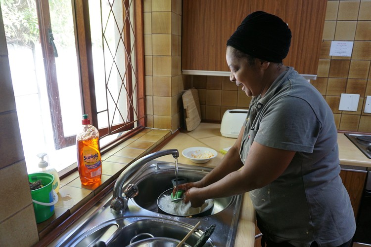 Photo of woman at sink