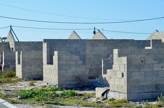 Photo of unfinished houses 