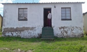 Photo of man in house