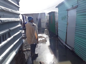 Photo of flooding and shacks