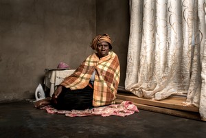 Photo of widow of Makatieho Selibo, a gold miner who died in 2013.